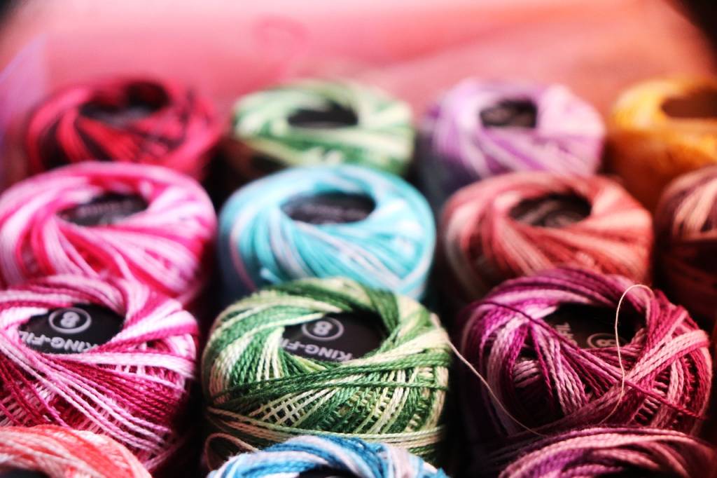Spools of colorful crochet yarn