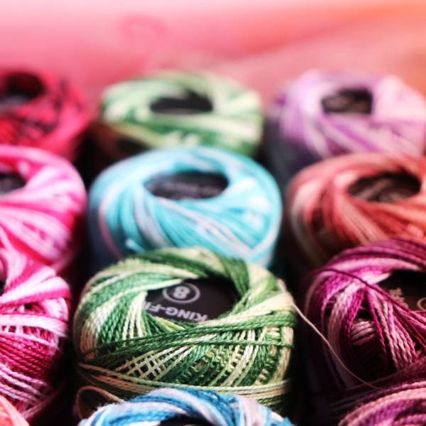 Spools of colorful crochet yarn